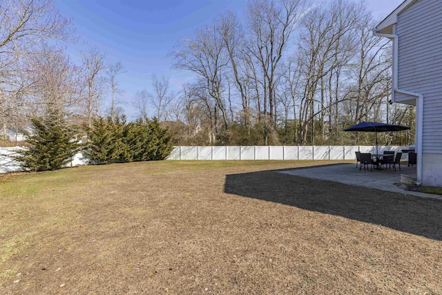 view of yard with a patio area and fence