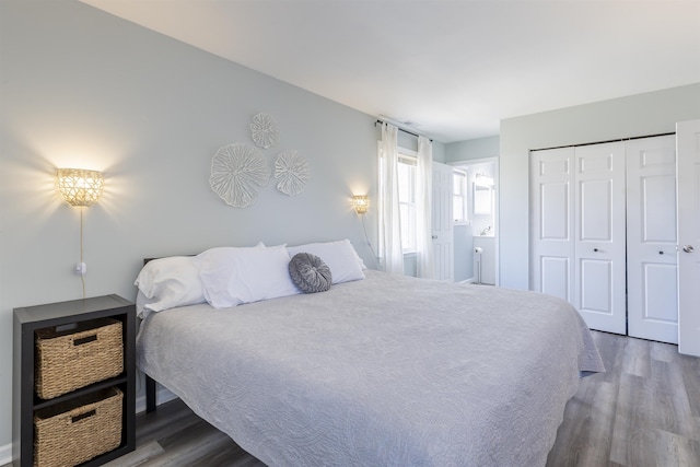 bedroom featuring a closet and wood finished floors