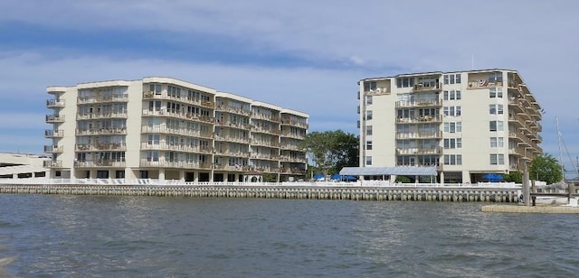 view of building exterior featuring a water view