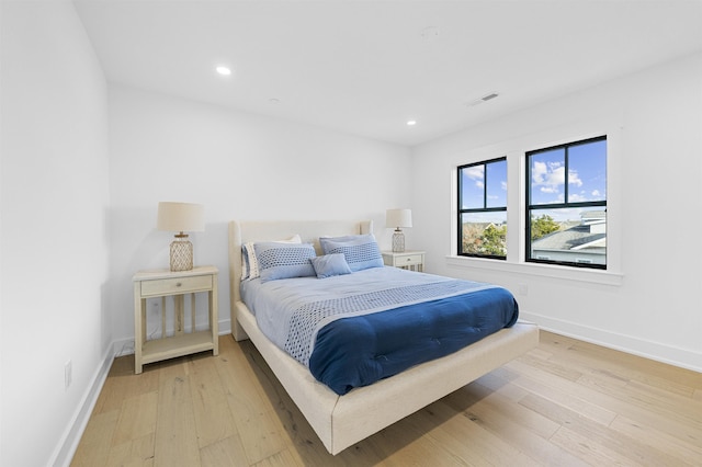 bedroom featuring light hardwood / wood-style floors