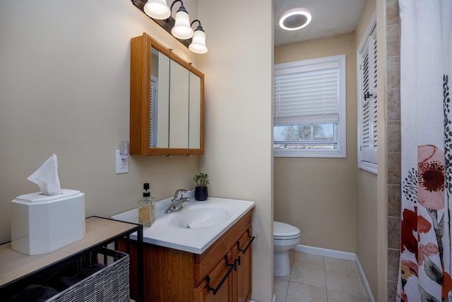 bathroom with a shower with shower curtain, vanity, toilet, and tile patterned flooring