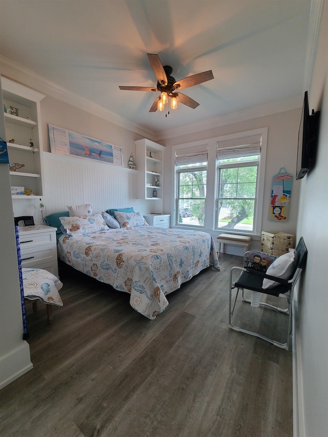 128 30th St, Avalon, NJ 08202 - bedroom with ornamental molding, dark wood finished floors, and ceiling fan