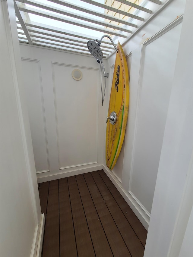 128 30th St, Avalon, NJ 08202 - detailed view of a decorative wall and wood finished floors