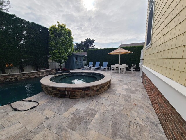 128 30th St, Avalon, NJ 08202 - view of swimming pool featuring a patio and a pool with connected hot tub