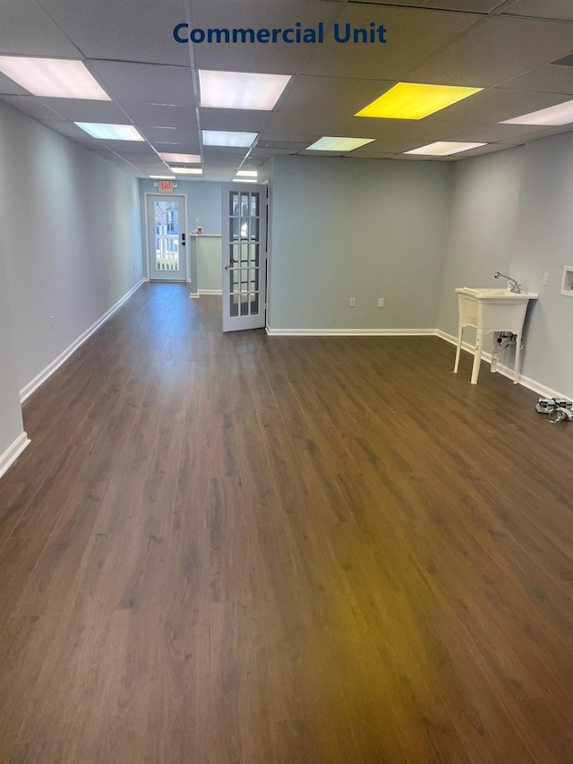 3009 Dune Dr Unit 5, Avalon, NJ 08202 - basement with a paneled ceiling and wood finished floors