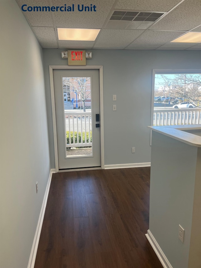 3009 Dune Dr Unit 5, Avalon, NJ 08202 - doorway to outside with a paneled ceiling, dark wood finished floors, and plenty of natural light