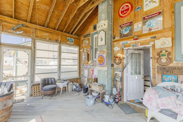 sunroom / solarium with lofted ceiling