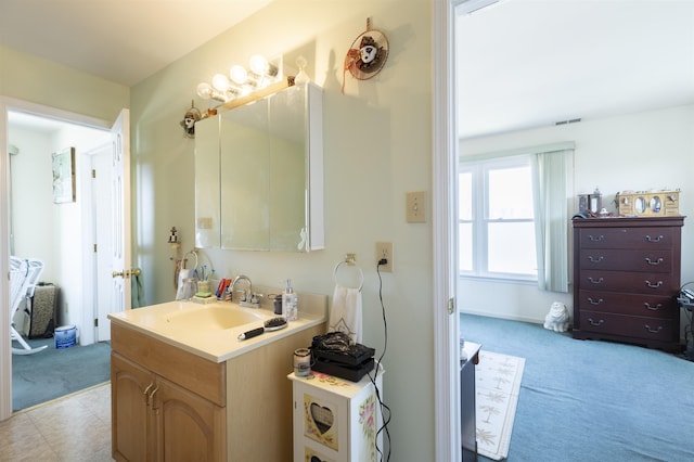 bathroom featuring vanity