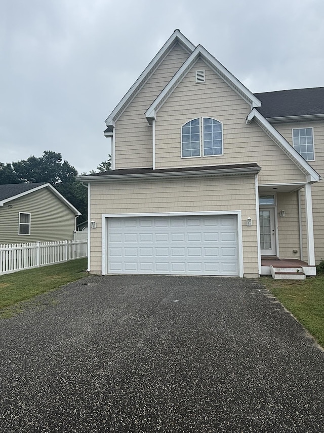 410 N 7th St Unit A, Rio Grande, NJ 08242 - traditional home featuring driveway, an attached garage, and covered porch