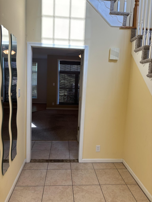 410 N 7th St Unit A, Rio Grande, NJ 08242 - hallway featuring light tile patterned floors, stairs, and light carpet