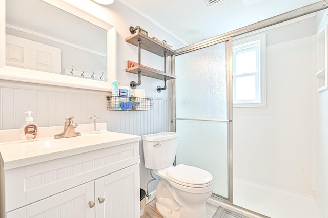 5301 Atlantic Ave Unit J, Wildwood, NJ 08260 - bathroom with a stall shower, vanity, a wainscoted wall, and crown molding