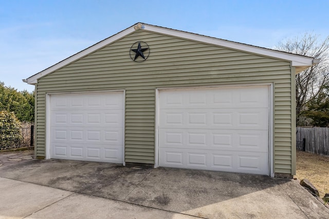 detached garage with fence