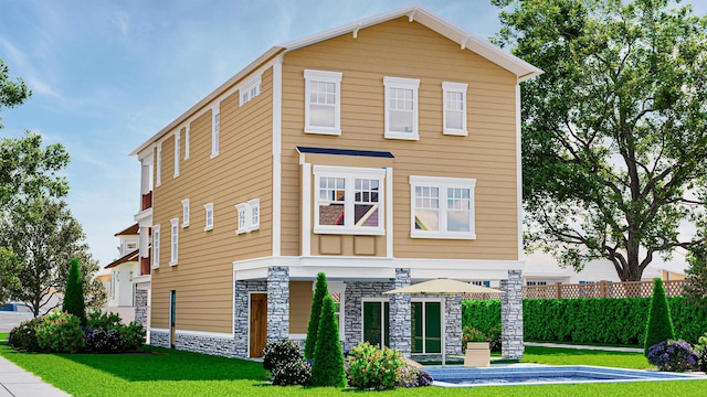 view of front of property featuring a front lawn