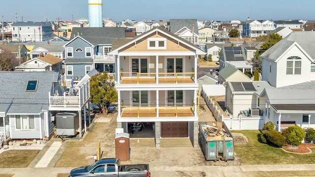 rear view of property featuring a residential view