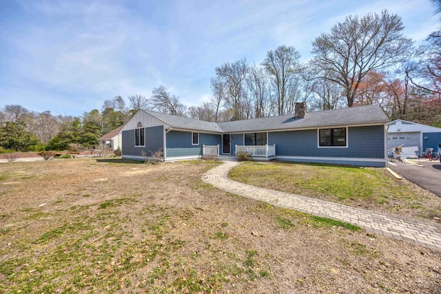 3108 Hemlock Rd, North Cape May, NJ 08204 - single story home with a porch, a chimney, a front yard, a detached garage, and an outdoor structure