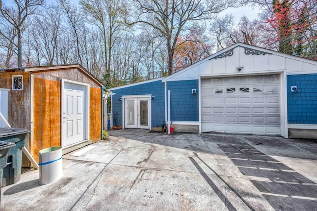 3108 Hemlock Rd, North Cape May, NJ 08204 - garage featuring french doors and concrete driveway