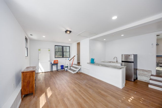 3108 Hemlock Rd, North Cape May, NJ 08204 - bar area featuring freestanding refrigerator, light wood finished floors, and recessed lighting