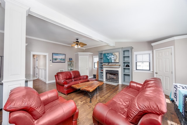 3108 Hemlock Rd, North Cape May, NJ 08204 - living room featuring dark wood-style flooring, a fireplace with flush hearth, a ceiling fan, beam ceiling, and crown molding
