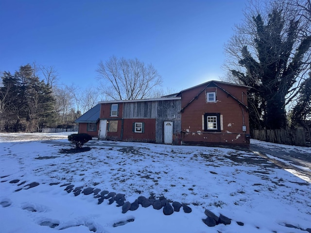 view of snow covered house