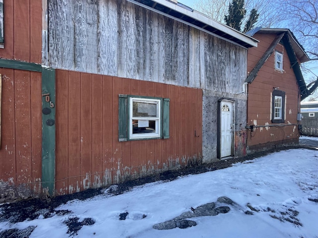 view of snow covered property