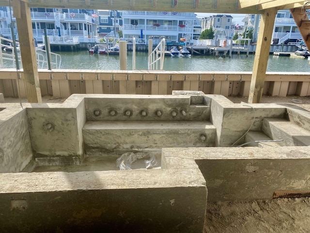 2425 Harbor Ave Unit 2425, Avalon, NJ 08202 - view of patio / terrace with a water view and a dock