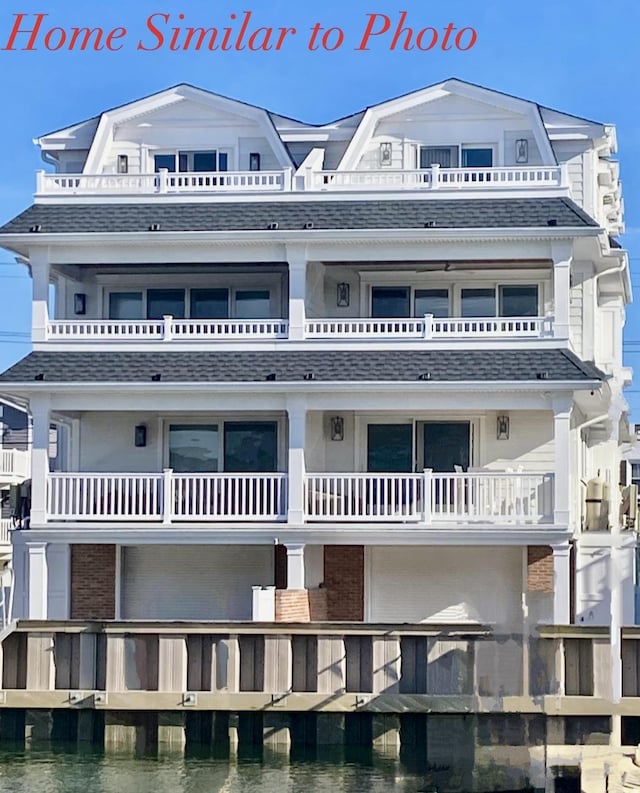 view of property with a water view