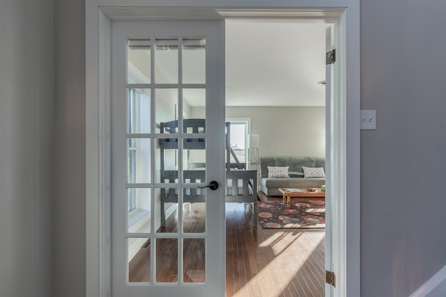 doorway to outside featuring french doors and wood-type flooring