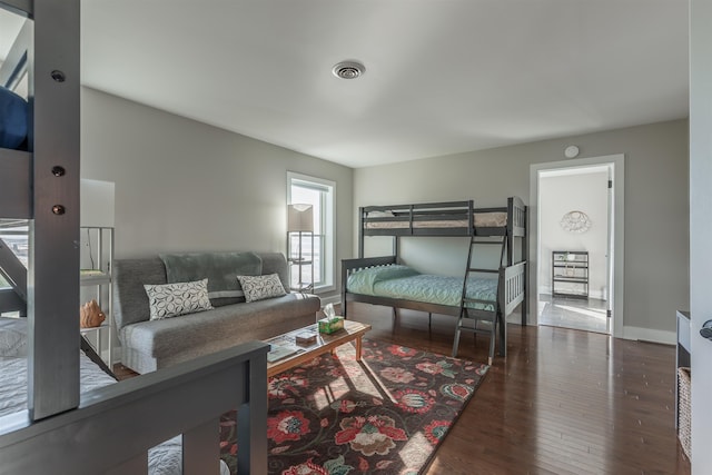 bedroom featuring dark hardwood / wood-style floors