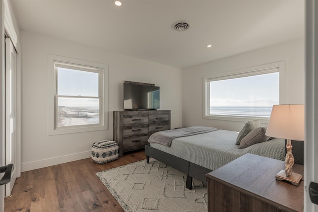 bedroom featuring hardwood / wood-style flooring