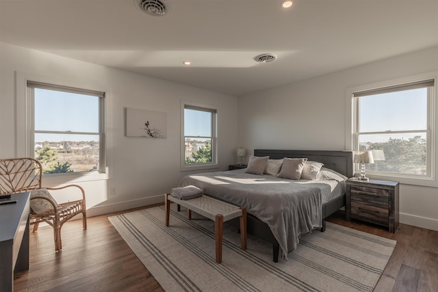 bedroom featuring dark hardwood / wood-style floors