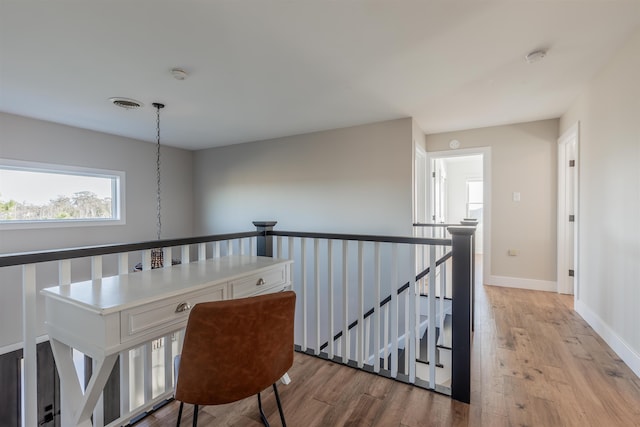 hall featuring light hardwood / wood-style floors