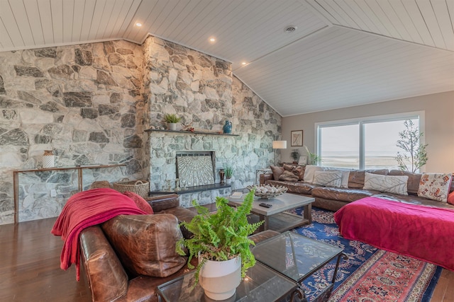 living room featuring wood ceiling, a stone fireplace, wood-type flooring, and vaulted ceiling