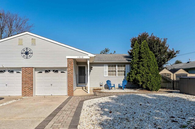 ranch-style home with a garage