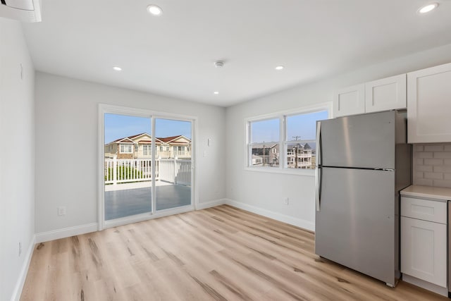2001 Surf Ave Unit 13, North Wildwood, NJ 08260 - unfurnished dining area with light wood-style floors, baseboards, and recessed lighting