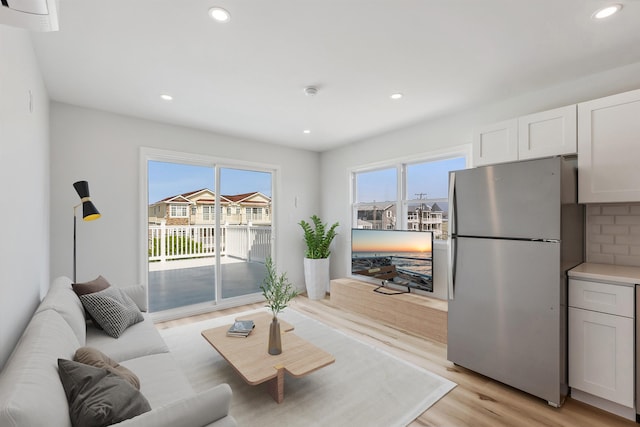 2001 Surf Ave Unit 13, North Wildwood, NJ 08260 - living room with light wood-style floors and recessed lighting