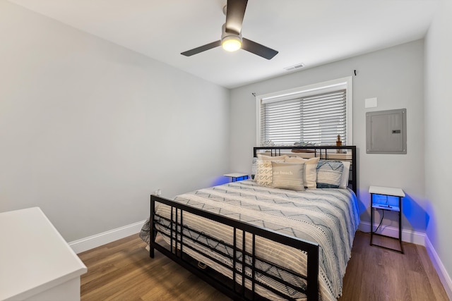 403 E 15th Ave Unit 3, North Wildwood, NJ 08260 - bedroom with electric panel, baseboards, wood finished floors, and ceiling fan