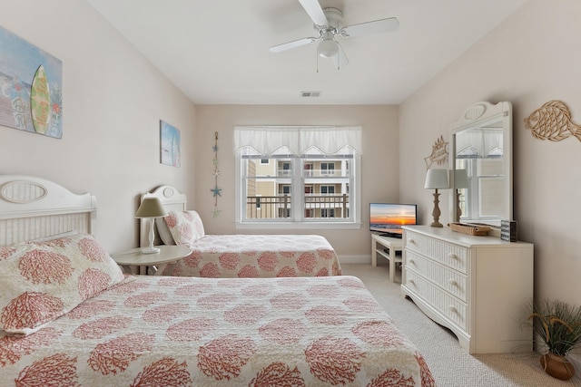 carpeted bedroom with ceiling fan