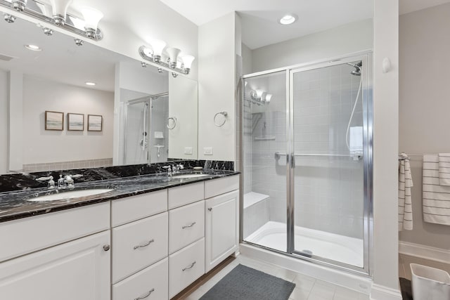 bathroom with vanity and walk in shower