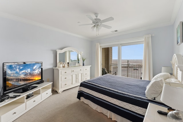 carpeted bedroom featuring ornamental molding, access to outside, and ceiling fan