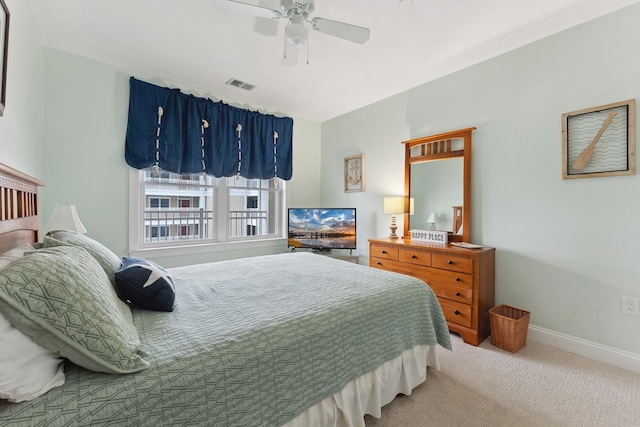 bedroom featuring ceiling fan and carpet flooring