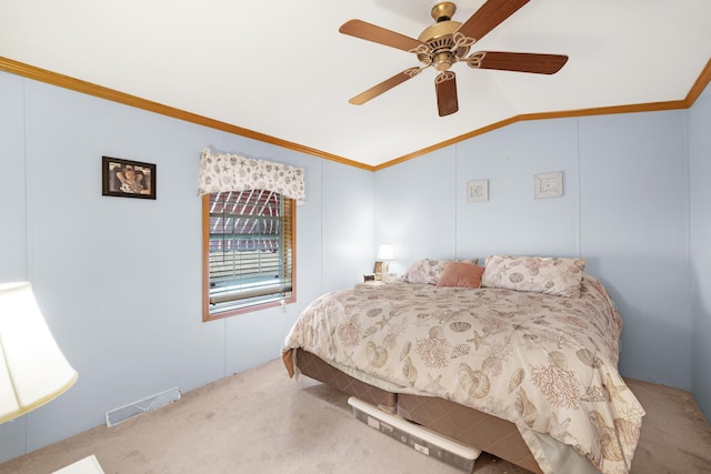 bedroom featuring ceiling fan, visible vents, carpet floors, lofted ceiling, and ornamental molding