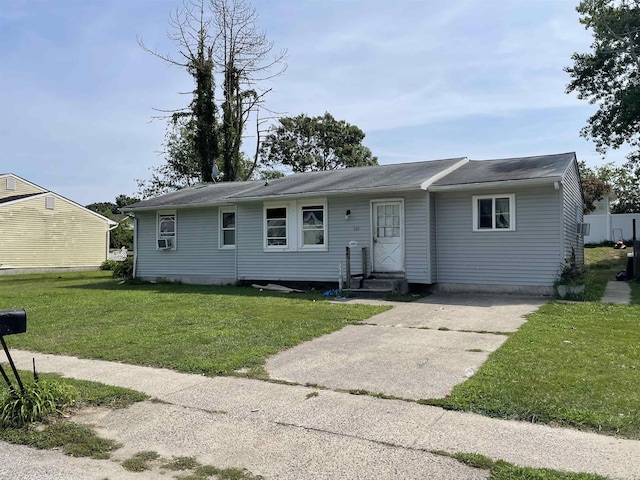 single story home with a front lawn