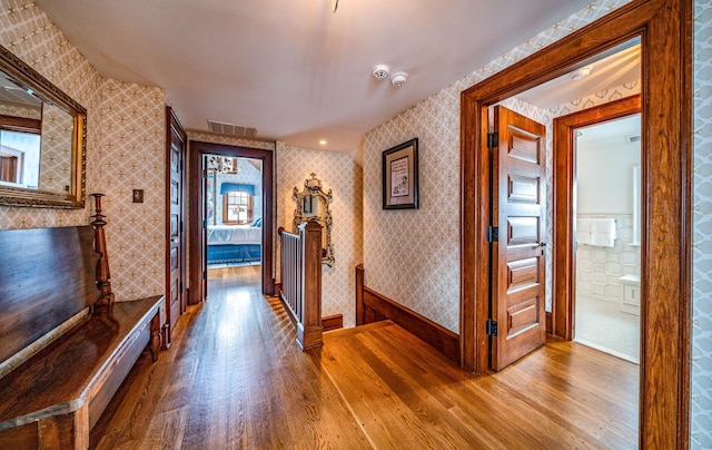 hall featuring wood-type flooring