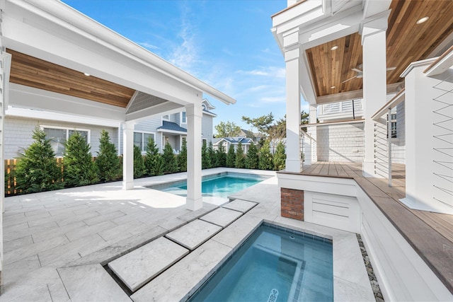 102 102nd St, Stone Harbor, NJ 08247 - outdoor pool featuring an in-ground hot tub and a patio