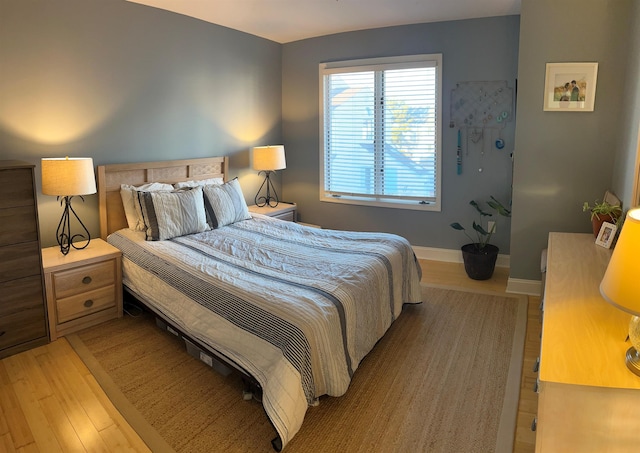 bedroom featuring wood-type flooring