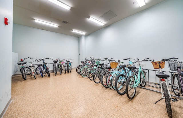 garage featuring bike storage and visible vents