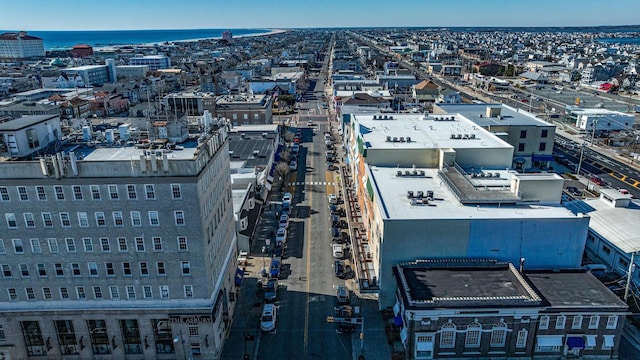 aerial view featuring a water view and a city view