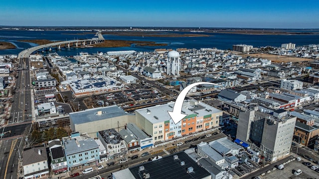 aerial view with a water view and a city view