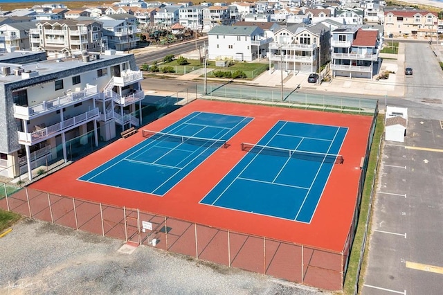 view of tennis court with basketball court