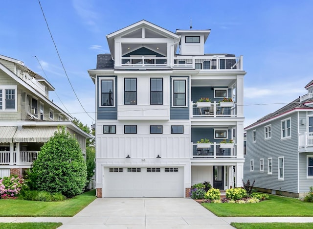 view of front of house featuring a front yard and a garage